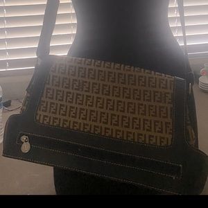 Fendi S.A.S Roma-made in Italy. Light brown with dark brown strap and inside bag